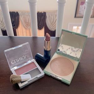 Pink blush, dark red lipstick, full face powder